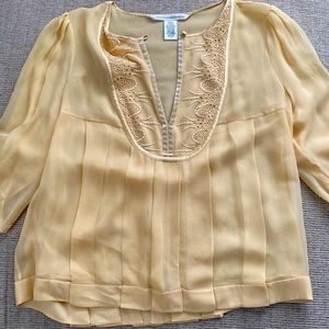 Diane von Furstenberg silk blouse. Soft yellowish/cream color.